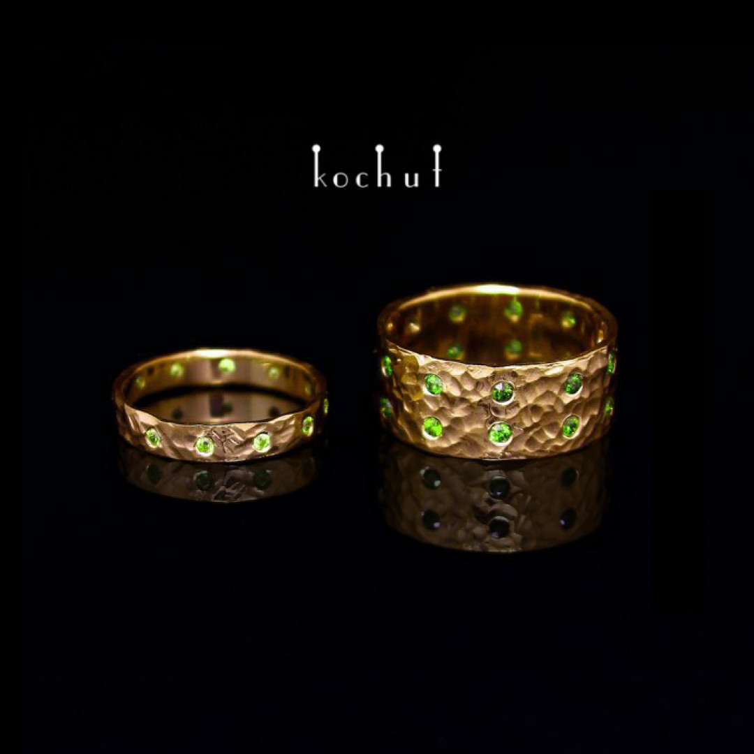Wedding rings "Fortress of Love". Yellow gold, green cubic zirkonia