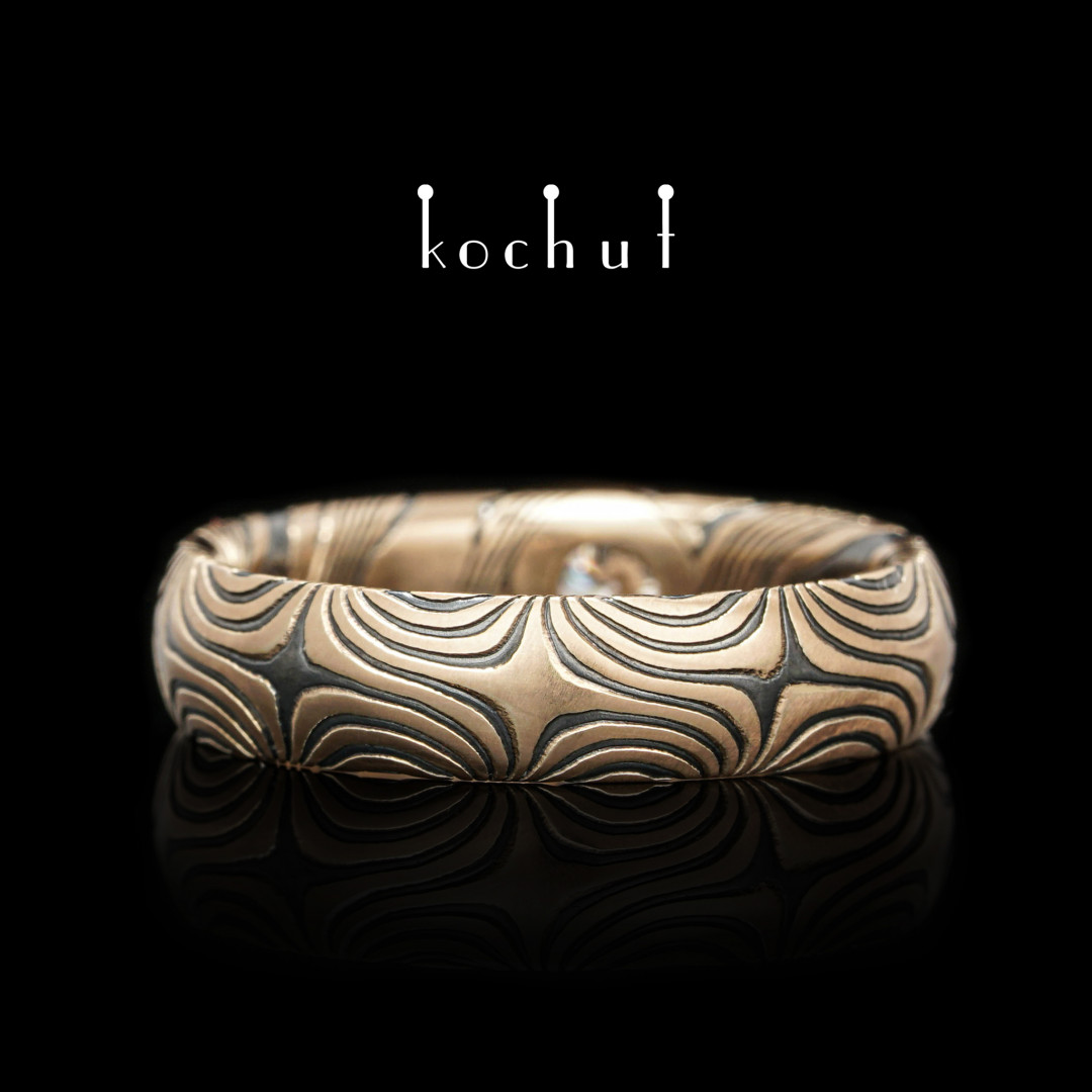Wedding ring mokume «Orion». Red gold, etched silver