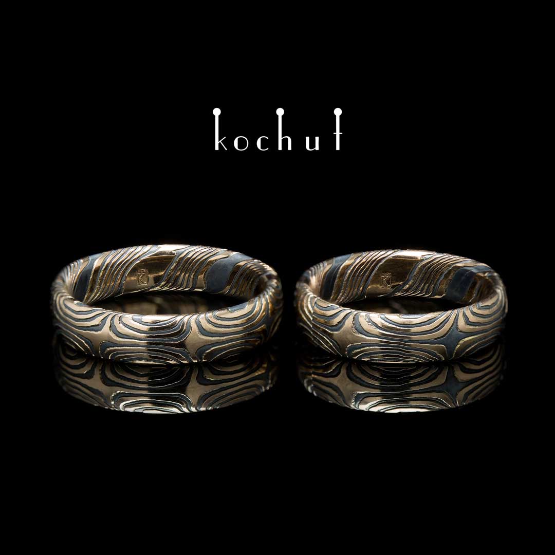 Wedding rings mokume «Orion». Red gold, etched silver