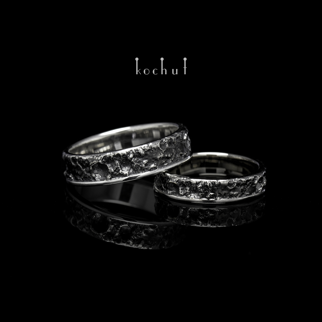 Wedding rings "Mercury" with a rim. Silver, oxidation