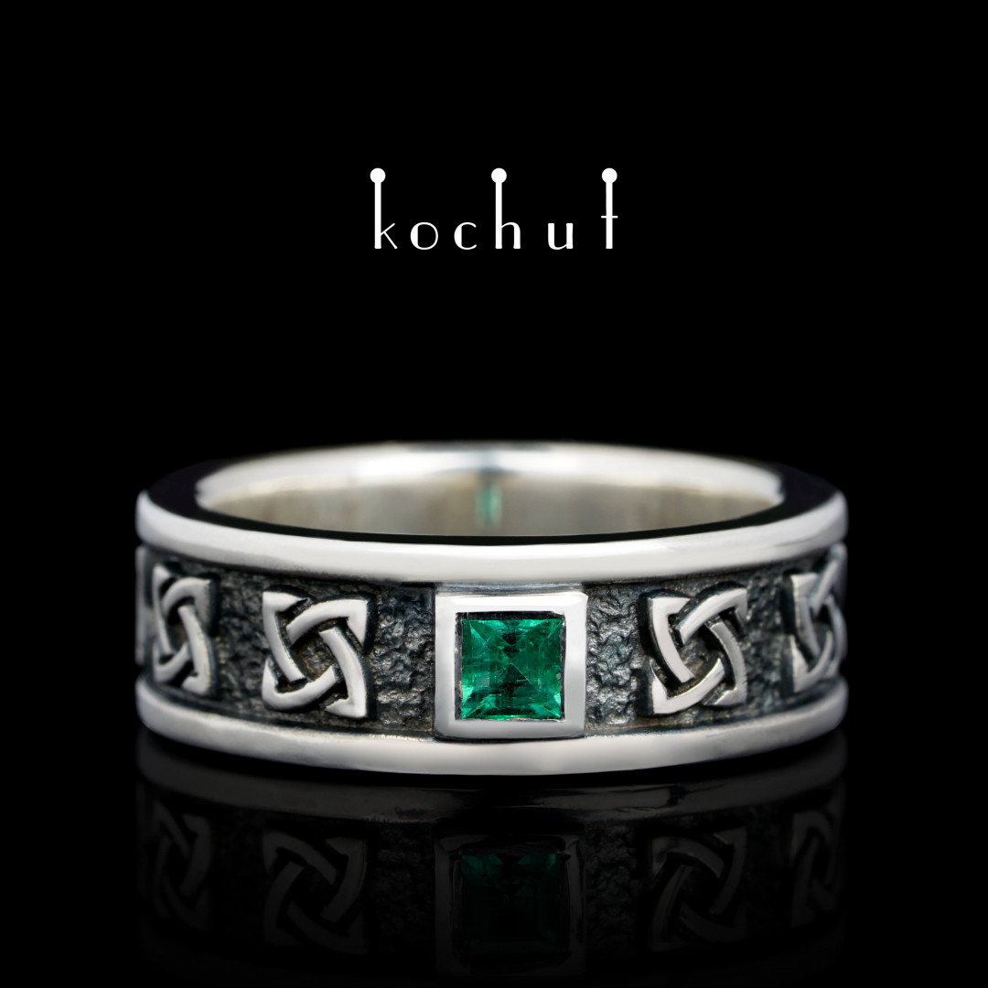 Flat-shaped wedding ring «Celtic guardian». Silver, emerald, oxidized