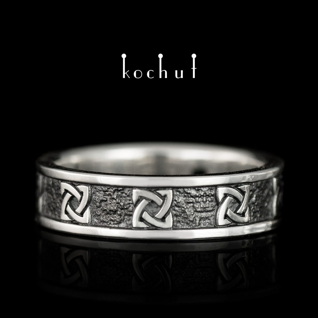 Flat-shaped wedding ring «Celtic guardian». Silver, oxidized
