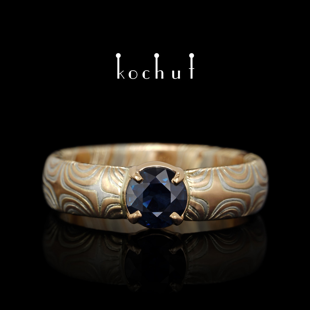 Ring mokume «Orion». Red gold, etched silver, sapphire