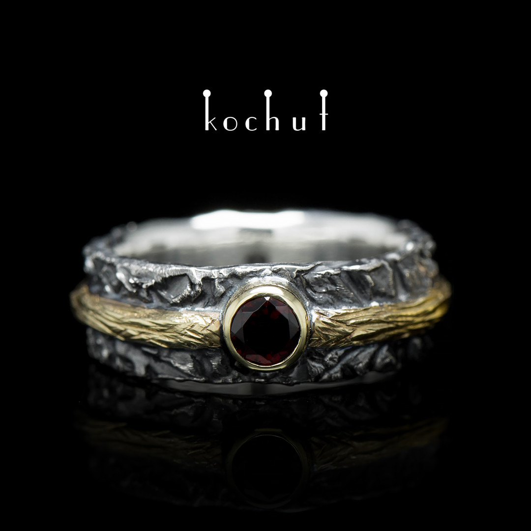 Engagement ring «Citadel». Silver, yellow gold, red garnet, oxidized