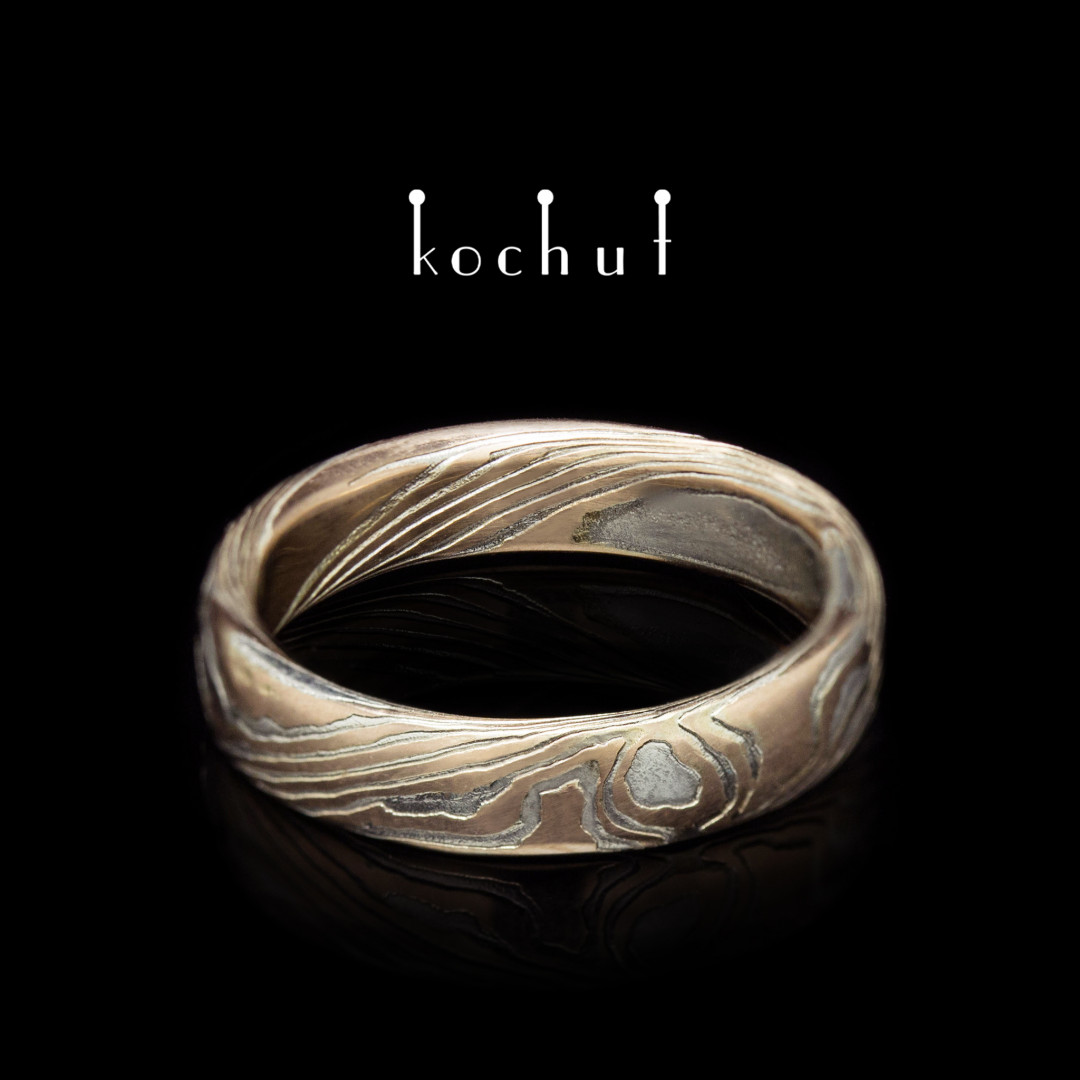 Sophora — Mokume wedding ring made of red gold and etched silver