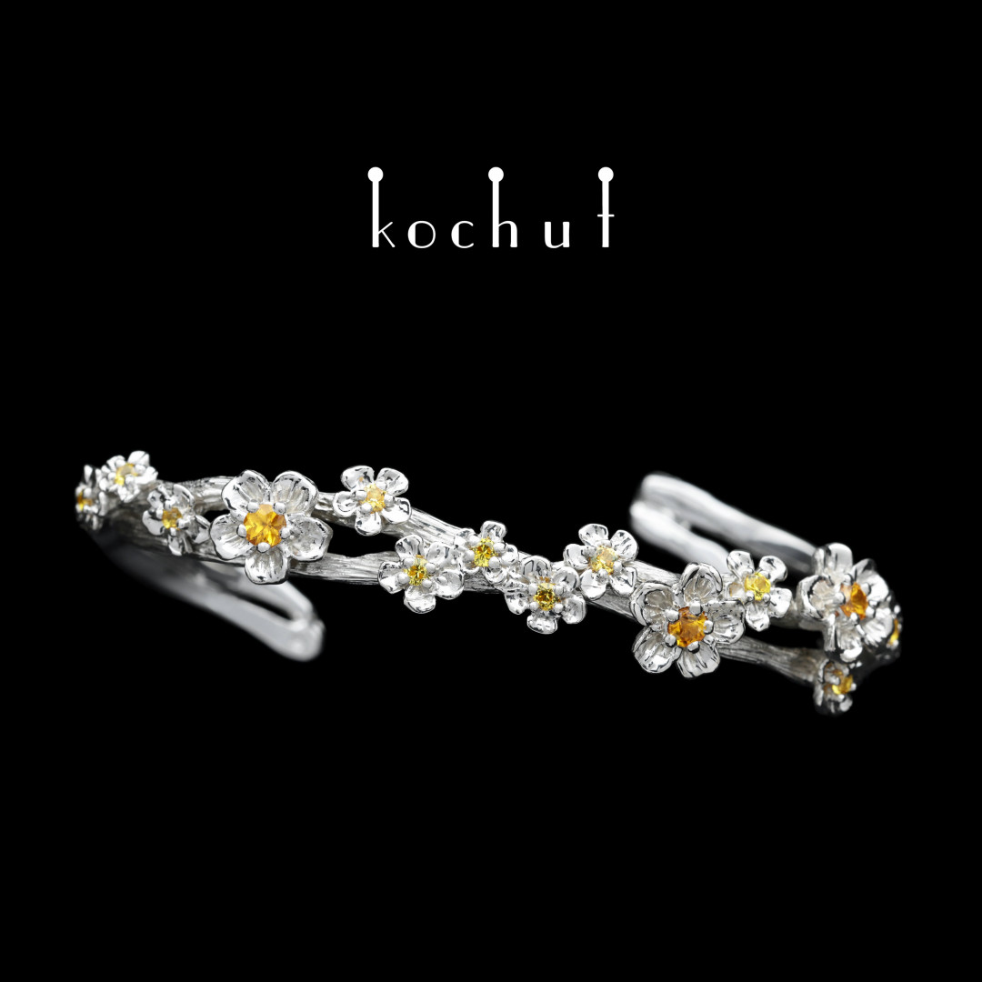 Bracelet «Flower tiara». Silver, white rhodium, yellow and orange sapphires