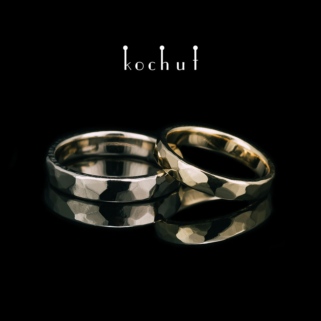 Classic wedding rings with forging Light. White and yellow gold
