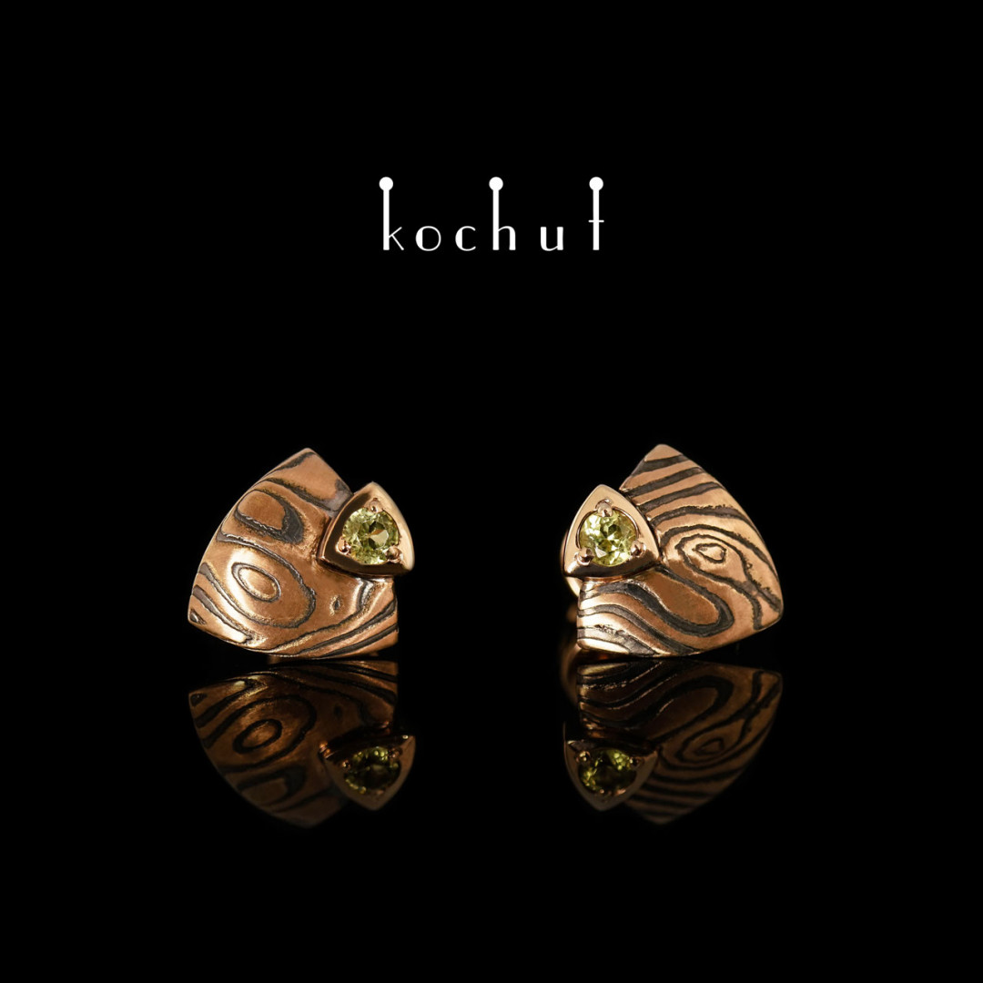 Earrings mokume «Seiche». Red gold, etched silver, chrysolite, oxidation