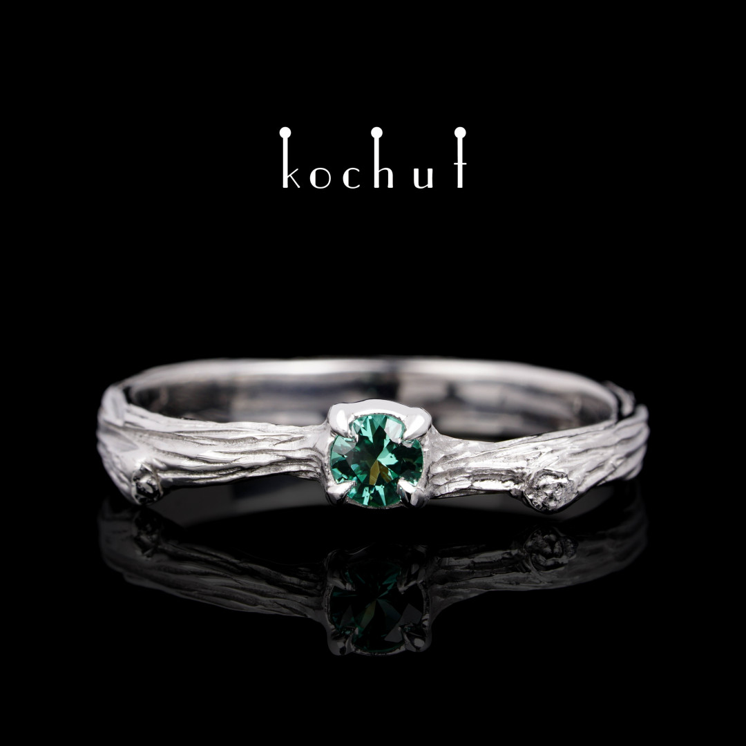 Ring «Fragile twig». Silver, white rhodium, emerald