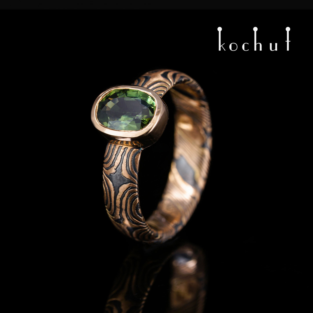 Precious astrolabe — mokume ring with green sapphire oval
