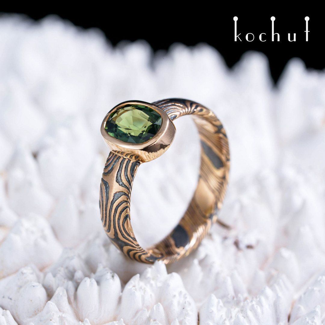 Precious astrolabe — mokume ring with green sapphire oval