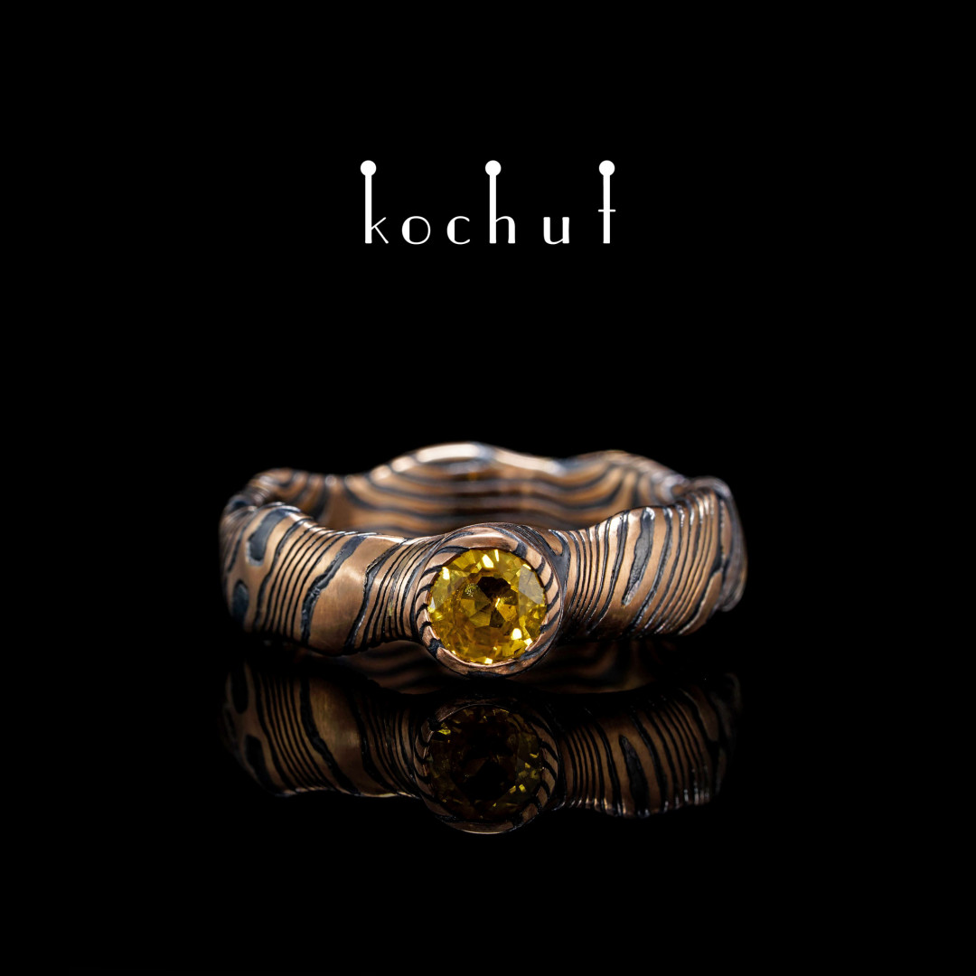 Seamless mokume ring «Polar lights». Red gold, etched silver, sapphire, oxidized