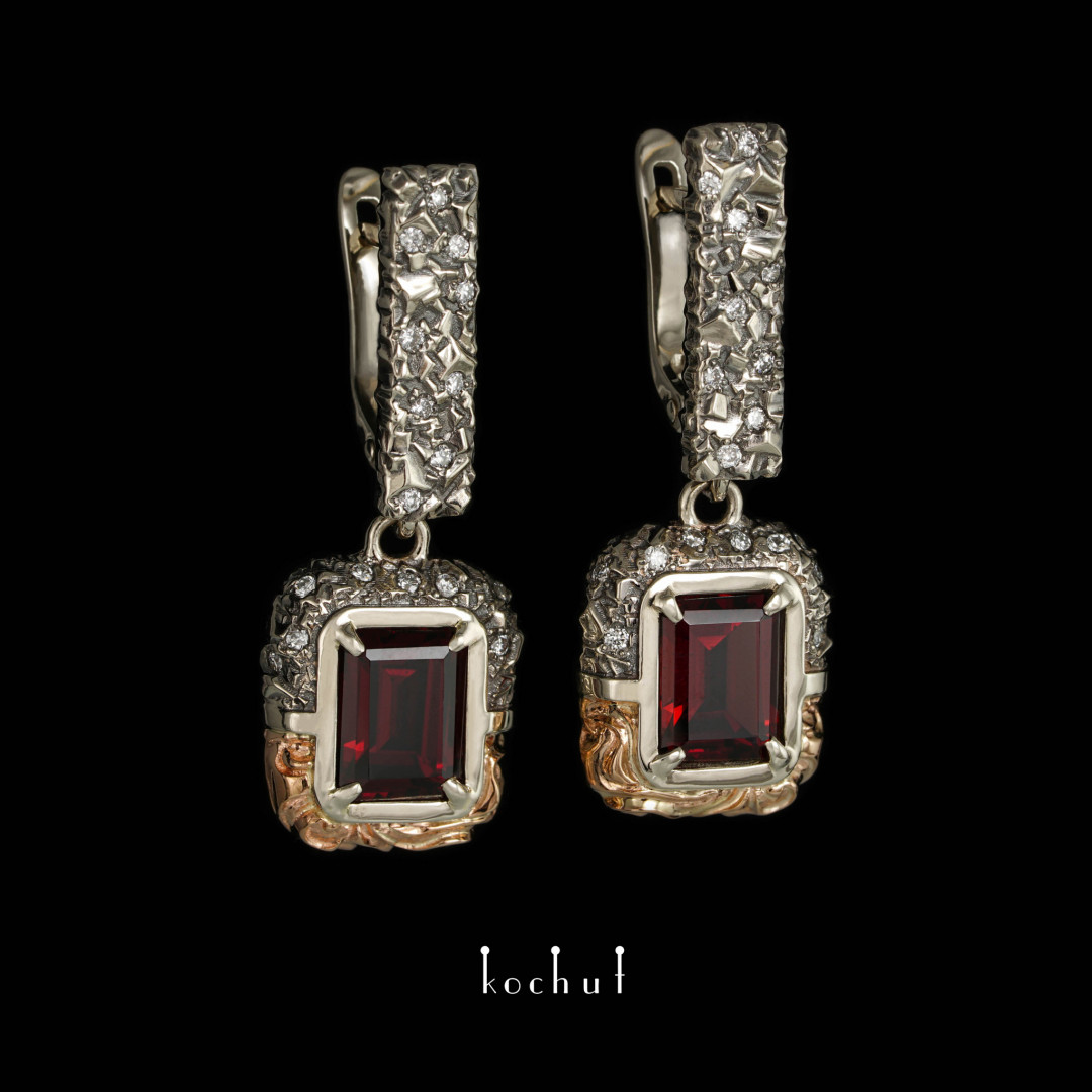Earrings «Secrets of the universe». White and red gold, garnets, diamonds, black rhodium