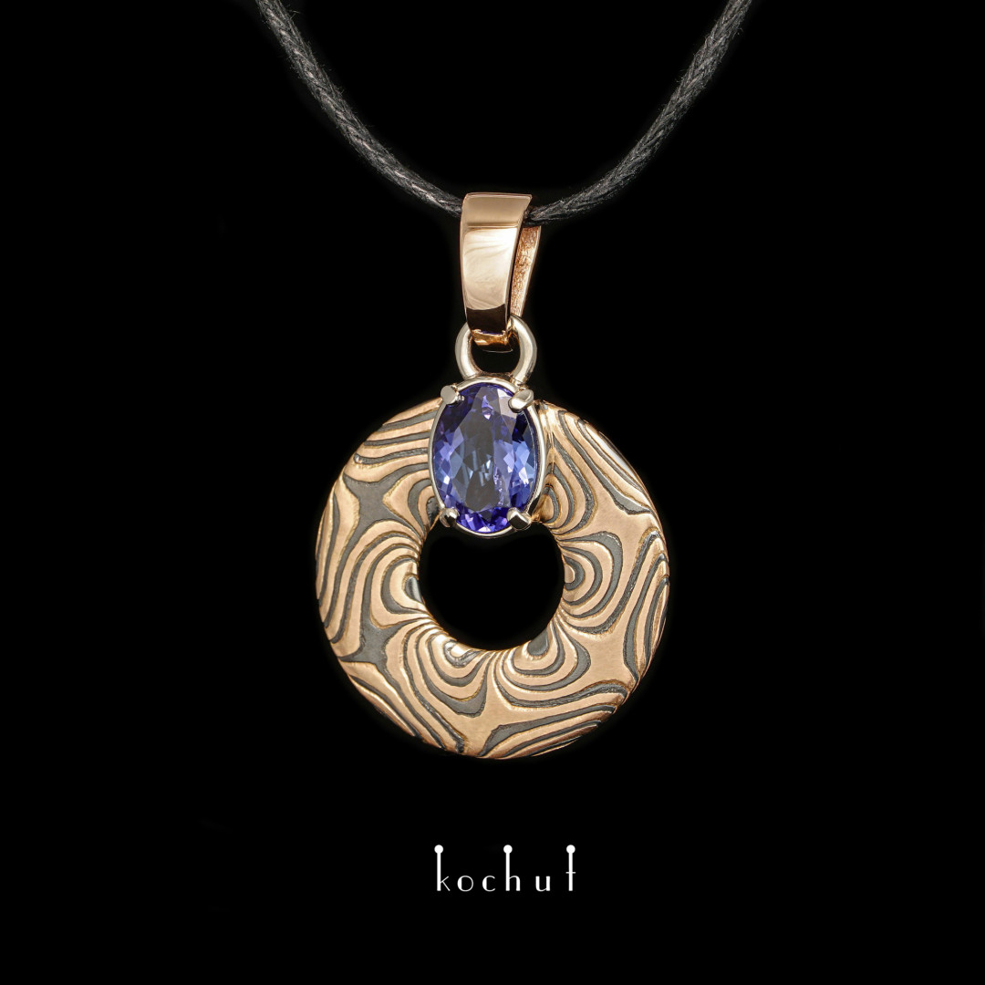 Precious astrolabe — mokume pendant with tanzanite
