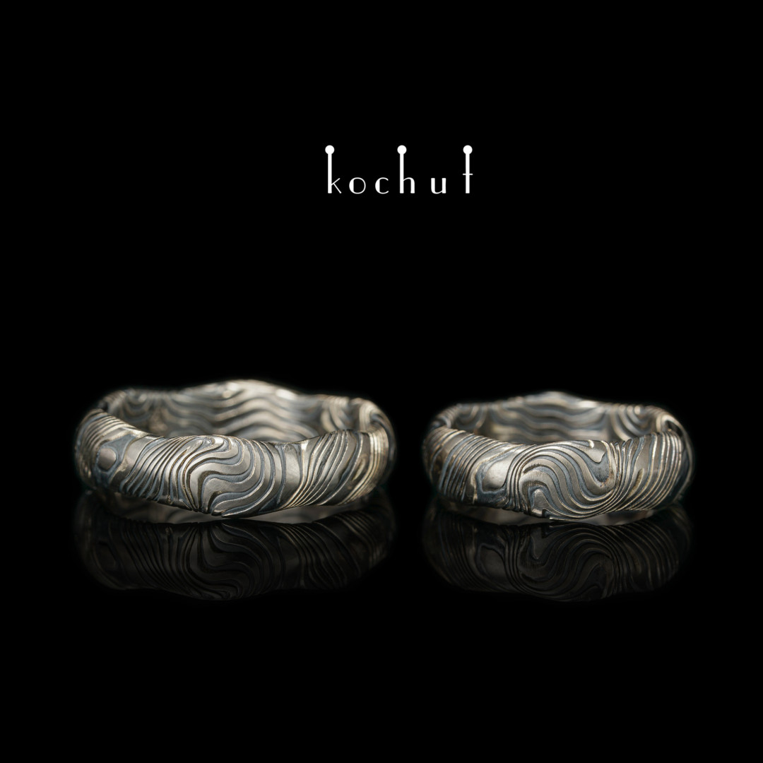 Wedding rings mokume «Waves». Palladium gold, etched silver, oxidation