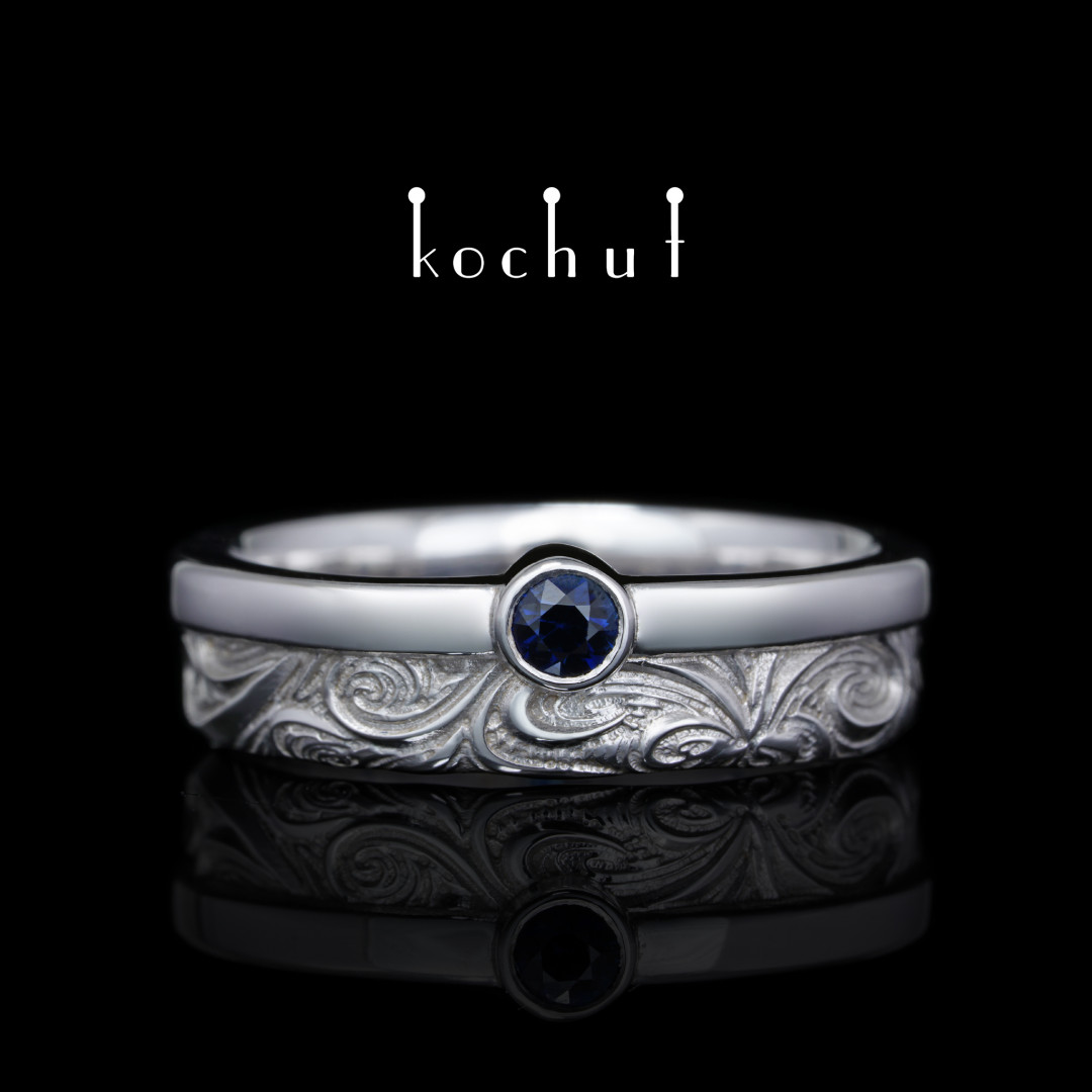 Wedding ring «In joy and sorrow: halves». White gold, sapphire, white rhodium