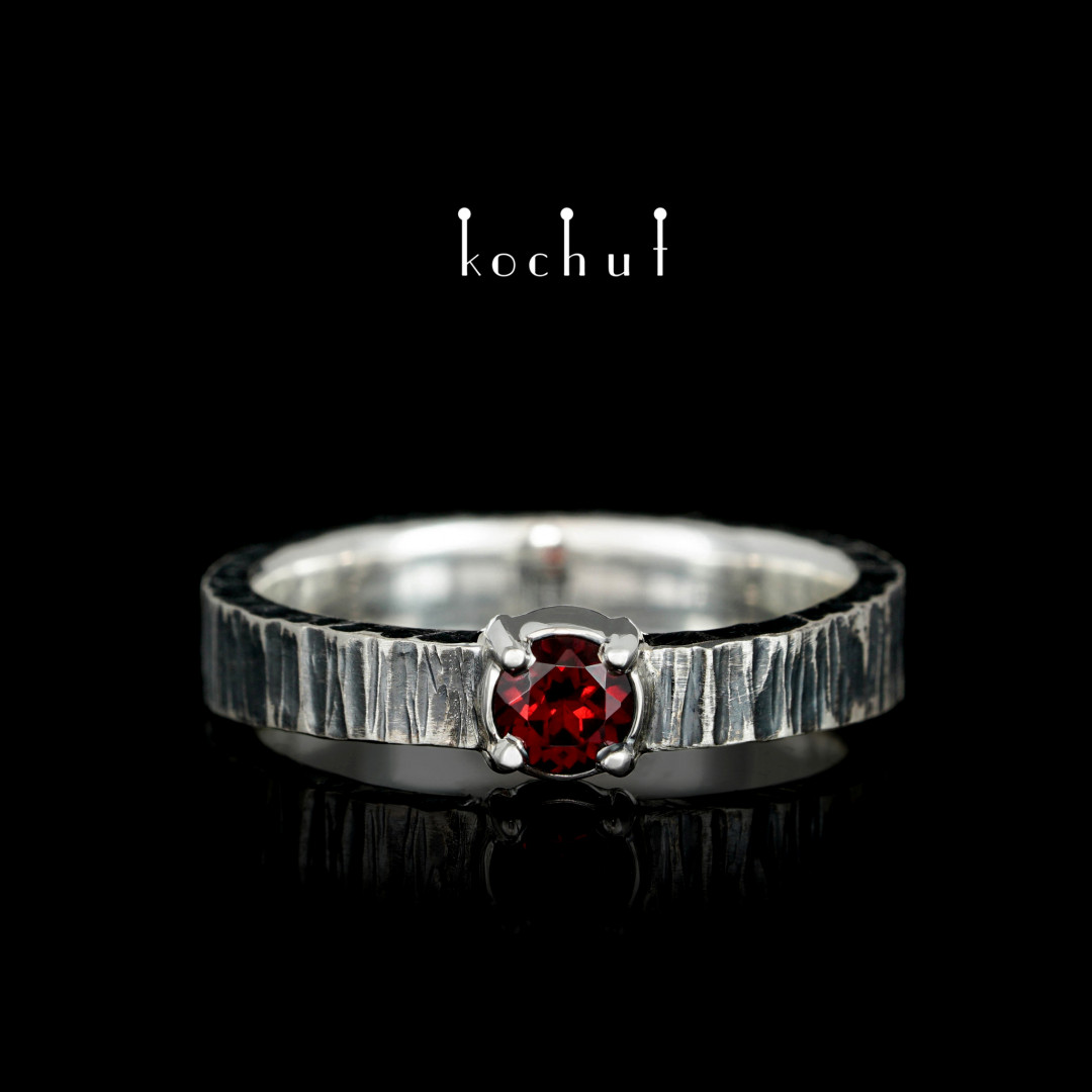 Ring «Nectar of love». Silver, red garnet, oxidized