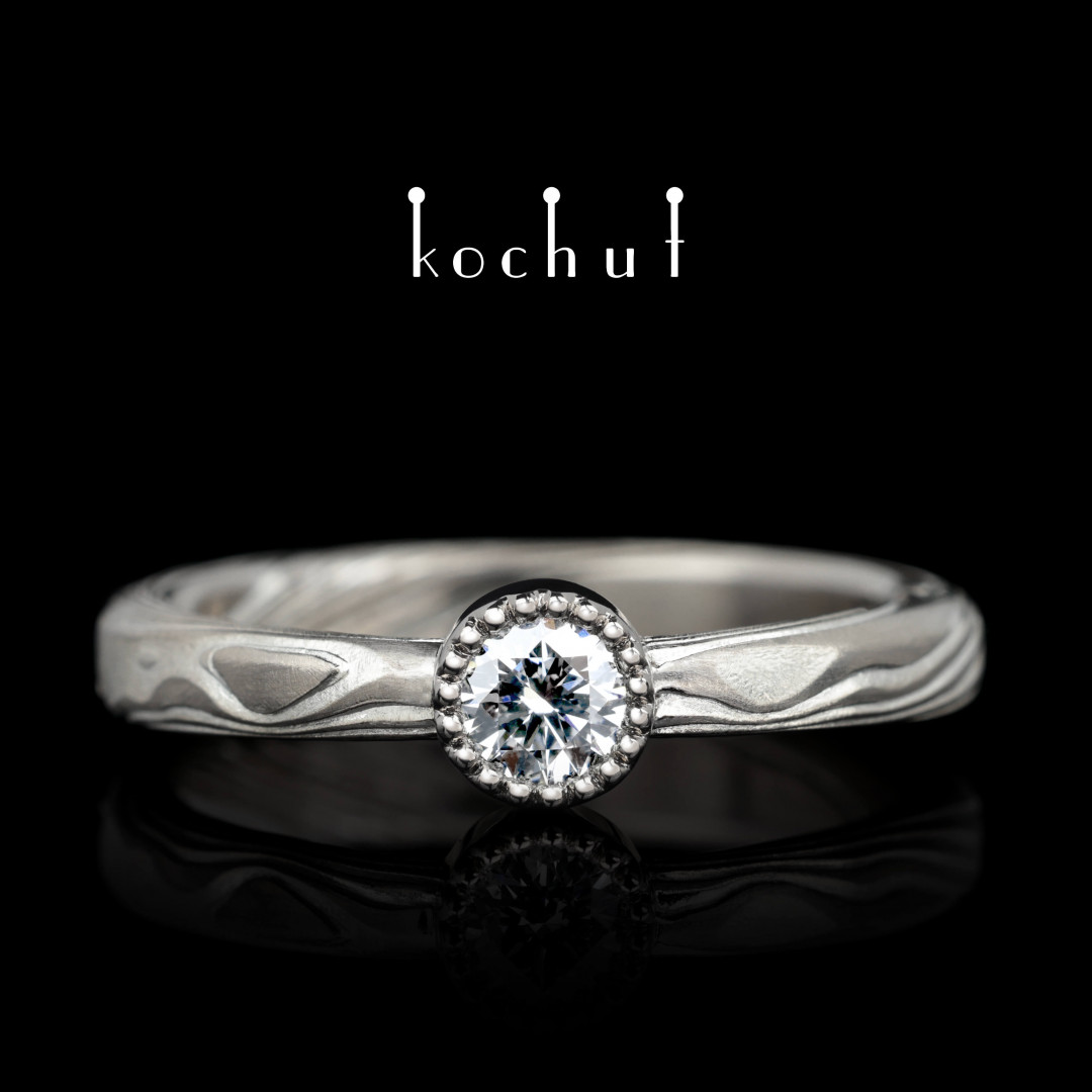 Engagement ring «Yuna» . Palladium gold, etched silver, diamond