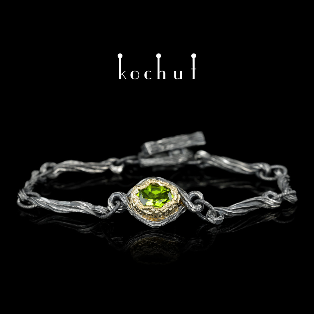 Bracelet «The source of life». Silver, yellow gold, chrysolite, oxidized