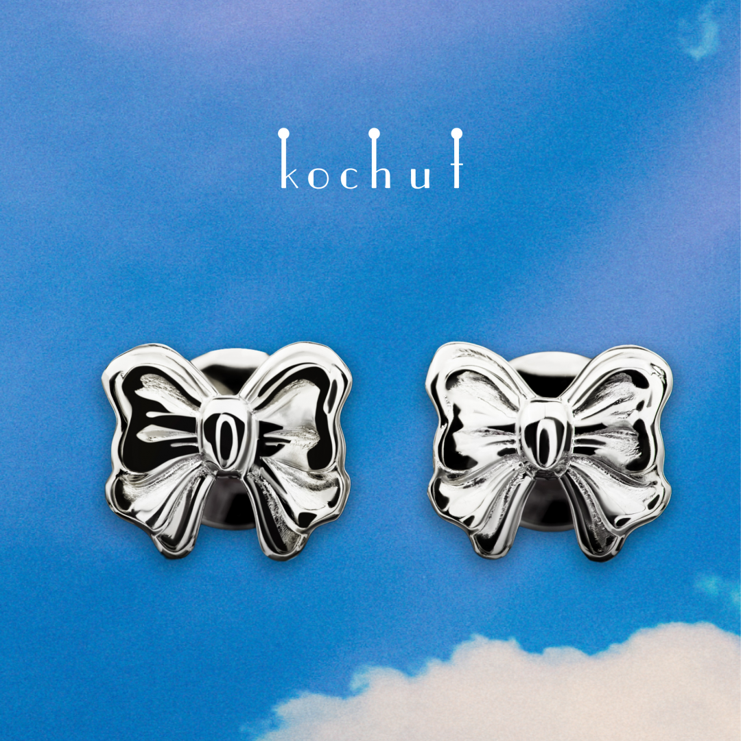 Earrings «Bow». White gold, white rhodium